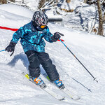 A guest skiing at Massanutten Resort