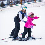 Guests taking a ski lesson at Massanutten Resort