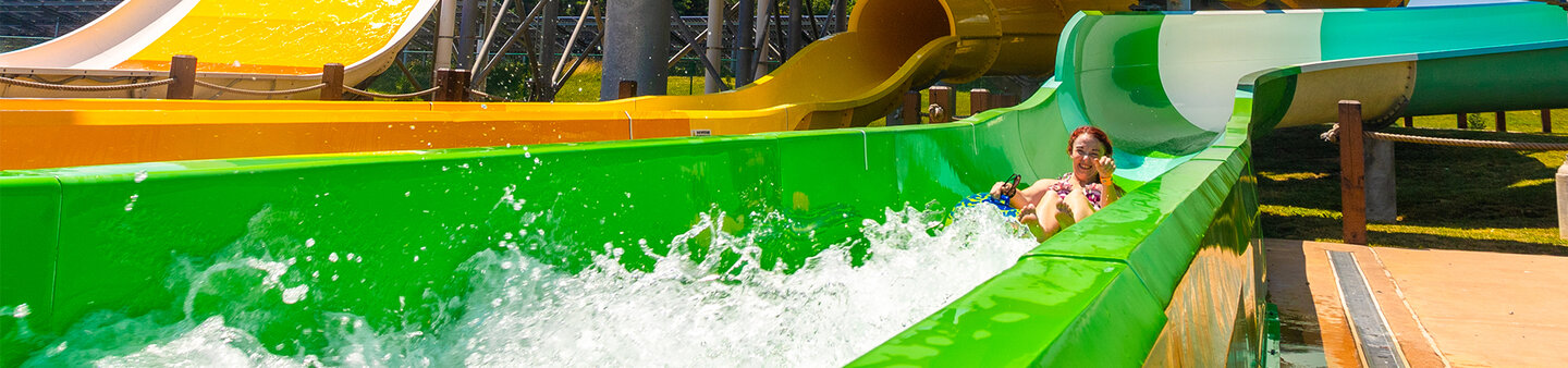 Guest splashes down at thrilling tube slide at Massanutten Outdoor water park