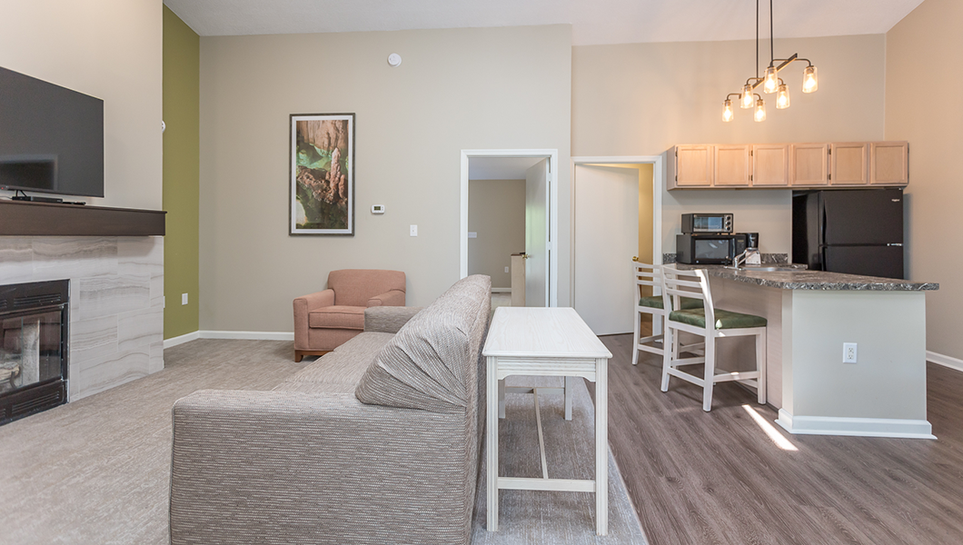 A photo of a living room & kitchen of an Eagle Trace condo at Massanutten Resort